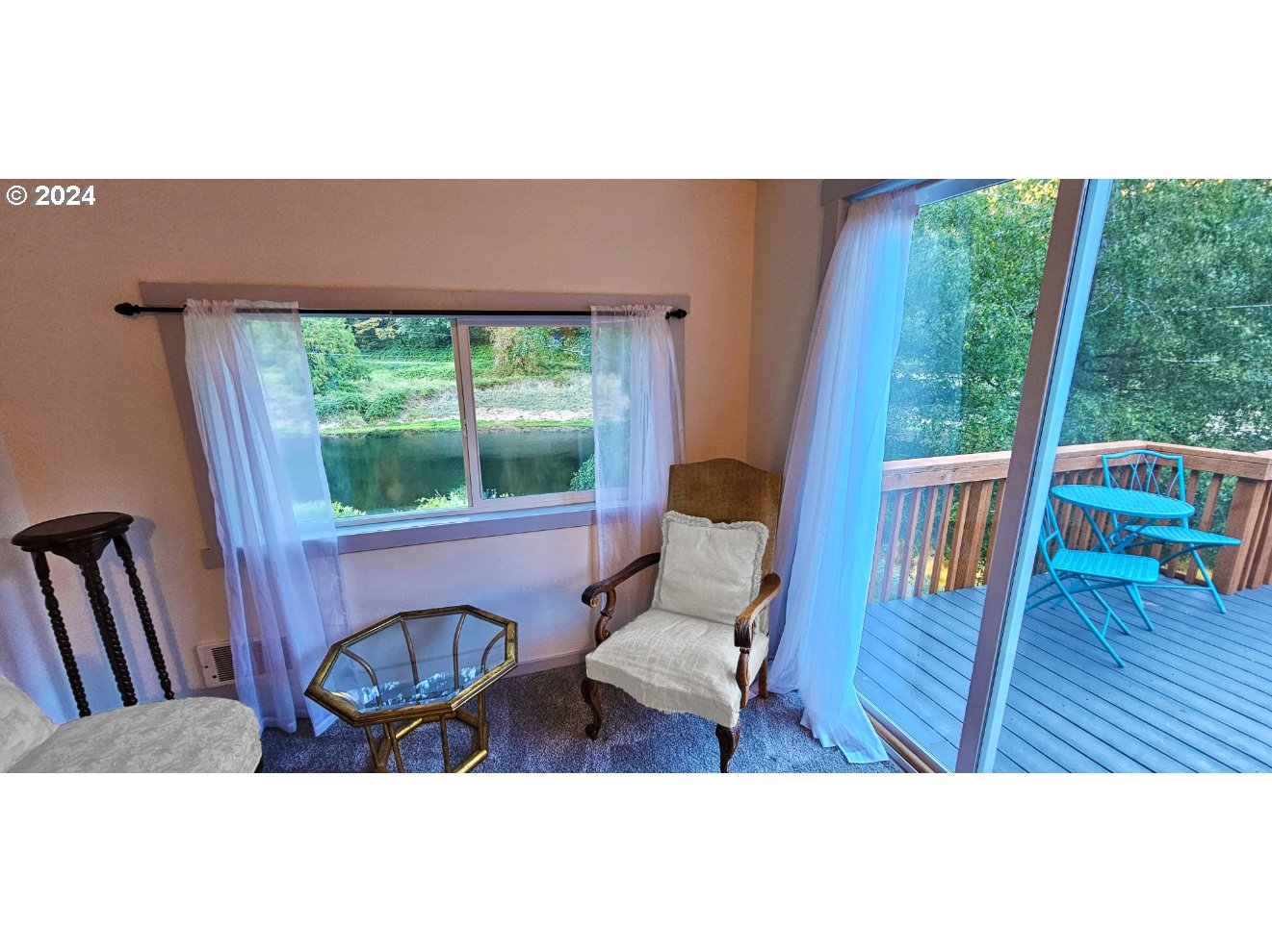 11354 Highway 36 Mapleton, OR 97453 - Photo 14 of 15 a view of living room with furniture and a large window