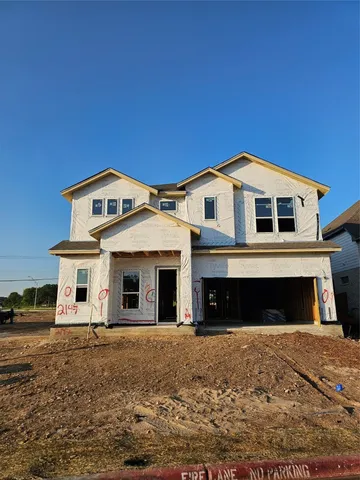a view of swimming pool with a garden and trees