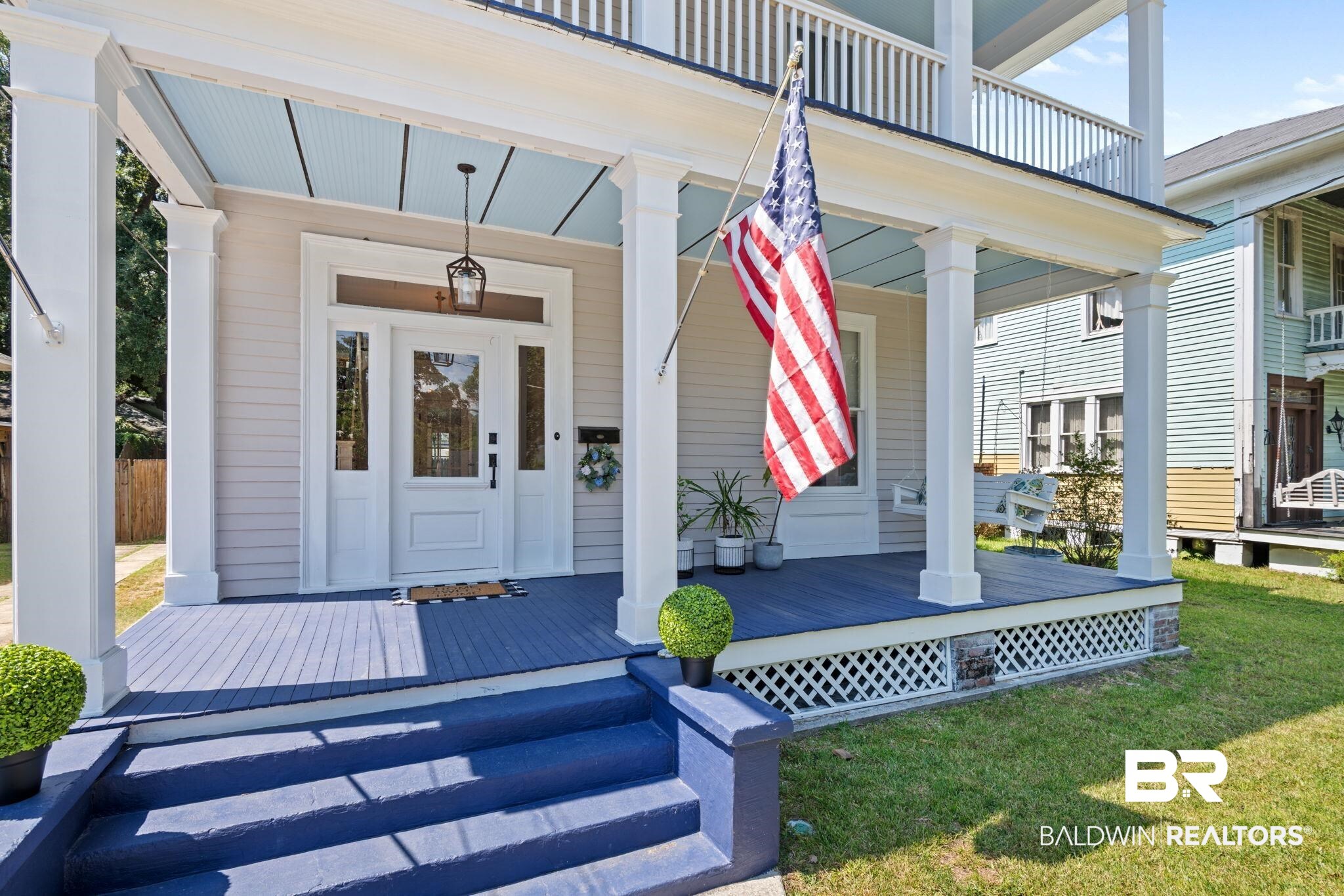 10 South Monterey Street Mobile, AL 36604 - Photo 5 of 45 View of exterior entry featuring a yard and a deck