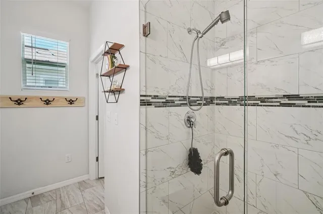 a view of a bathroom with a shower