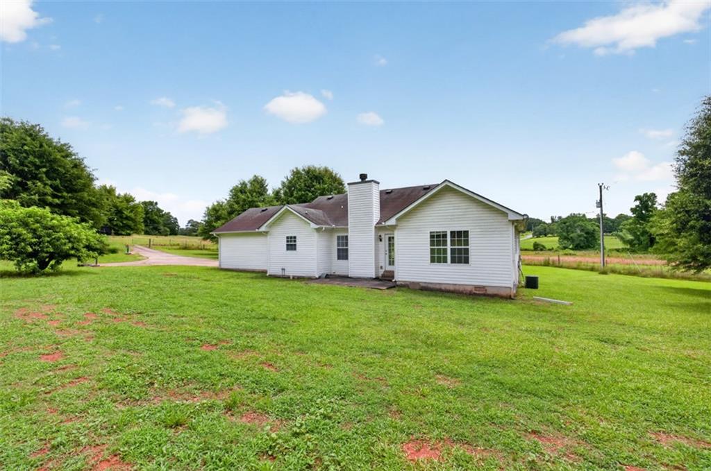 602 Pendergrass Road Winder, GA 30680 - Photo 39 of 44 a house view with a garden space
