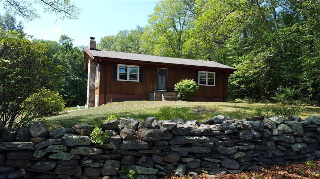 75 Shingle Mill Road Salem, CT 06420 - Photo 1 of 1 a front view of house with yard and green space