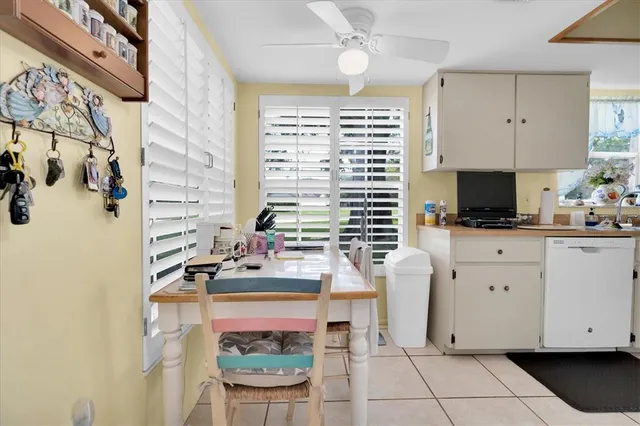 a bedroom with a bed dresser and a window