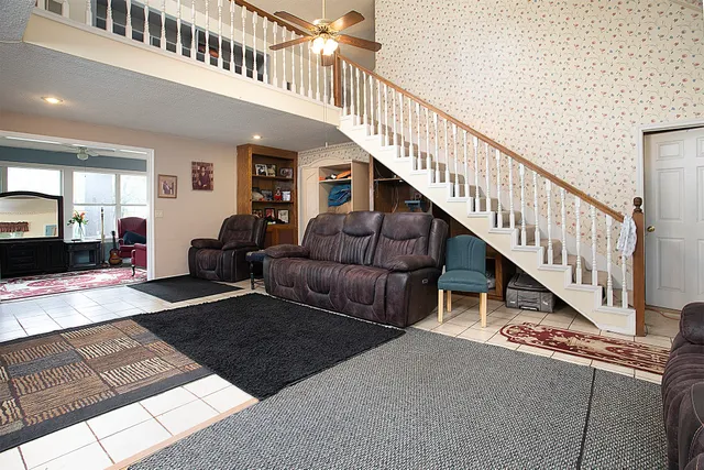 a view of a dining room with furniture and window