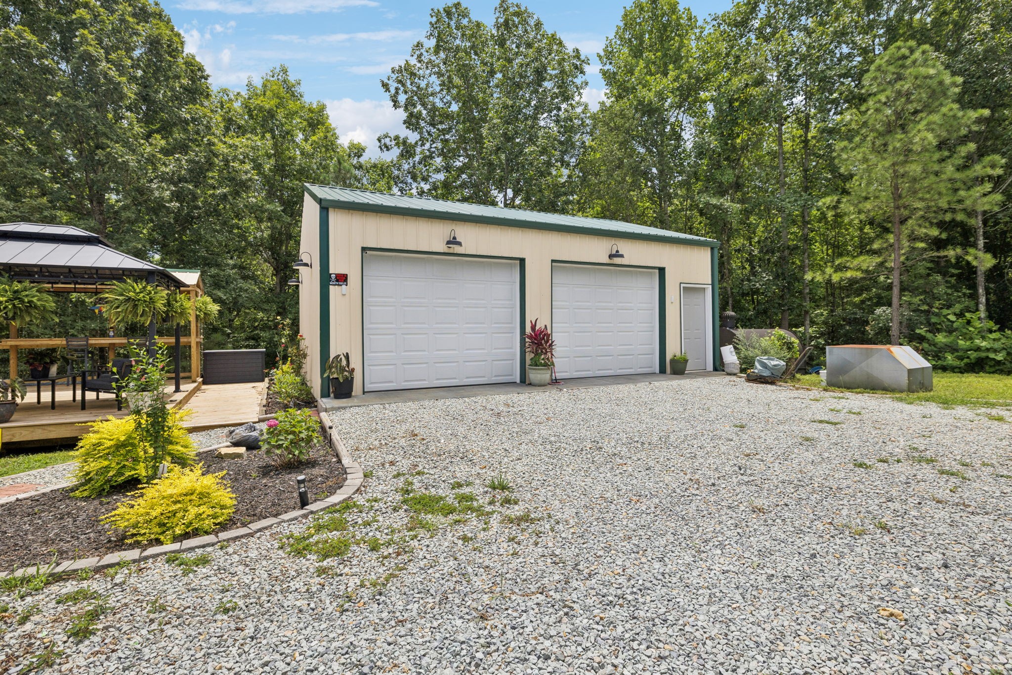 176 Robert Hensley Road Hohenwald, TN 38462 - Photo 34 of 53 a view of backyard of house