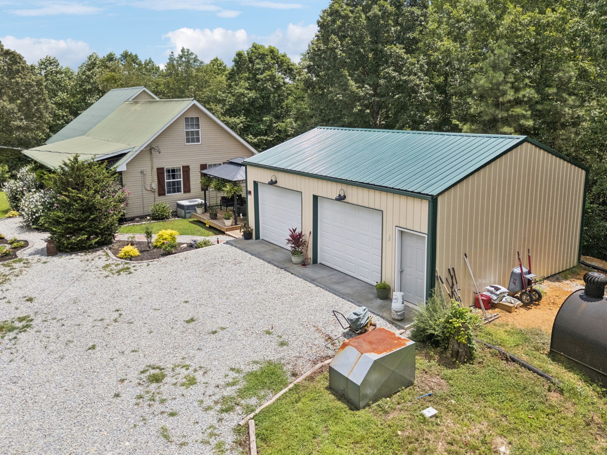 176 Robert Hensley Road Hohenwald, TN 38462 - Photo 36 of 53 a view of backyard of house