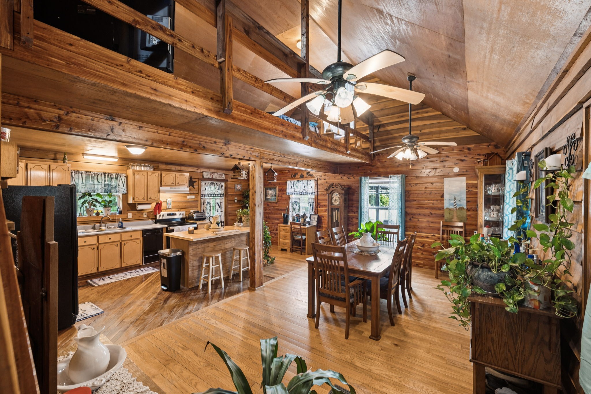 176 Robert Hensley Road Hohenwald, TN 38462 - Photo 8 of 53 a view of a dining room with furniture window and outside view