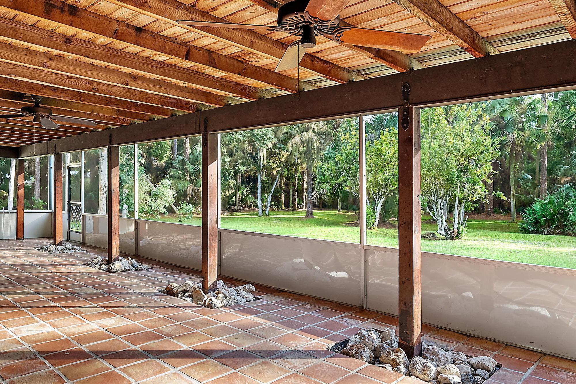 16486 95th Avenue North Jupiter, FL 33478 - Photo 21 of 34 a view of a backyard