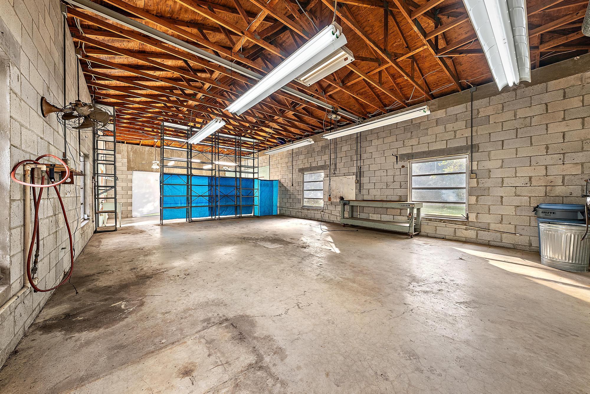 16486 95th Avenue North Jupiter, FL 33478 - Photo 27 of 34 a view of empty room with wooden ceiling