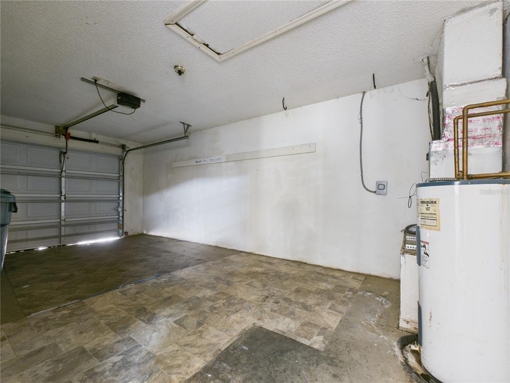 4116 Jason Road Spring Hill, FL 34608 - Photo 26 of 66 a view of a room with rack and racks on the wall