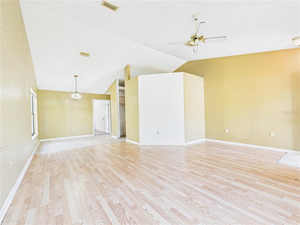 4116 Jason Road Spring Hill, FL 34608 - Photo 33 of 66 a view of a room with wooden floor