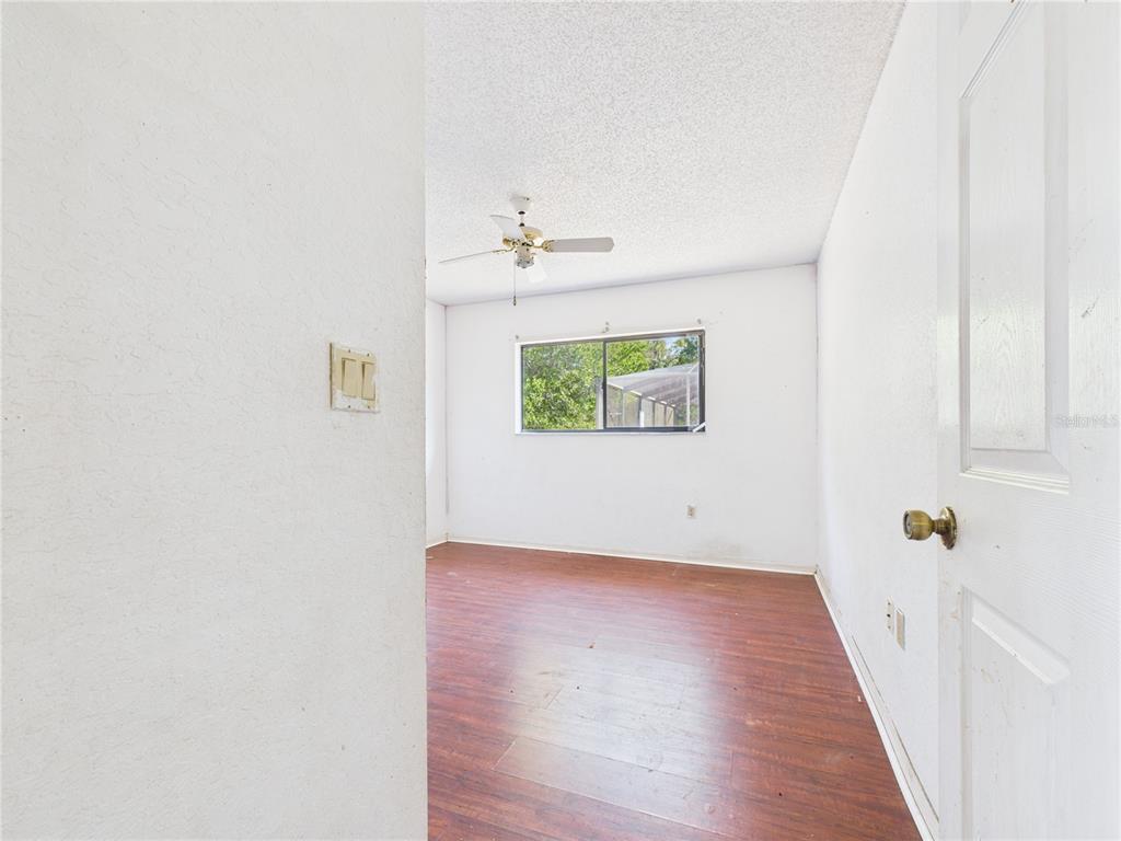 4116 Jason Road Spring Hill, FL 34608 - Photo 35 of 66 a view of an entryway with wooden floor