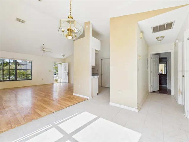 a aerial view of a house with a yard
