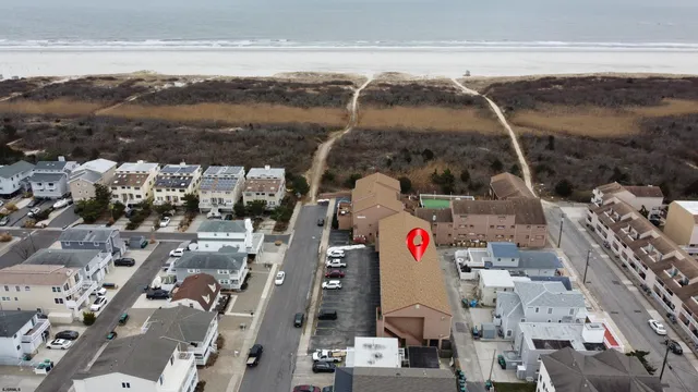 a white refrigerator freezer sitting inside of a kitchen