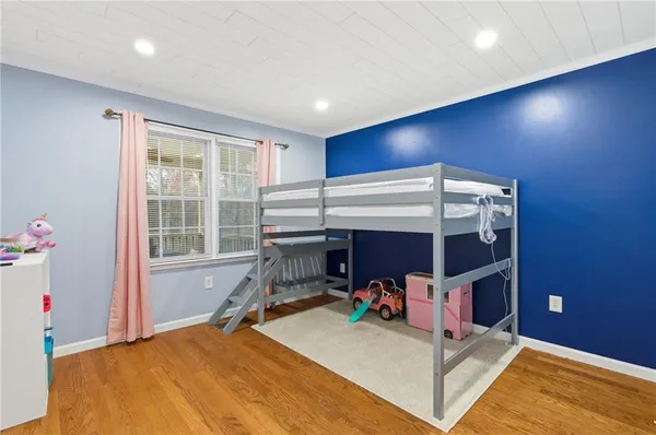 a room with furniture and a window