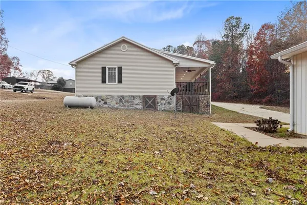 a house view with a backyard space