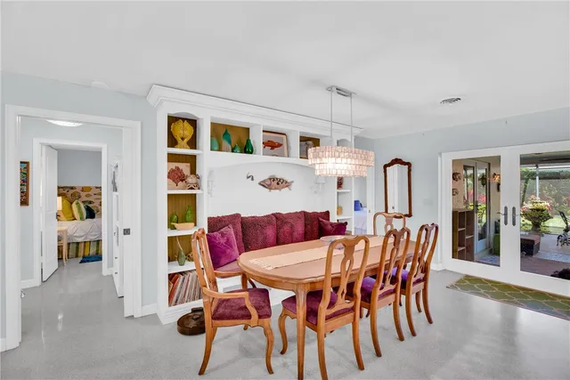 a large kitchen with lots of counter space and sink