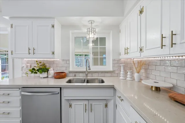 a bedroom with a bed and a night stand