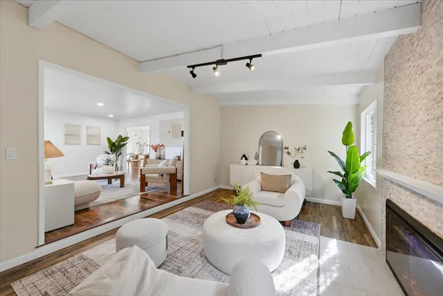 a kitchen with a sink dishwasher stove and refrigerator