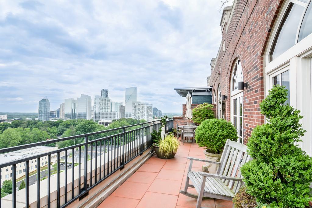 3180 Mathieson Drive Northeast, Unit 1503 Atlanta, GA 30305 - Photo 1 of 1 a view of a city from a balcony