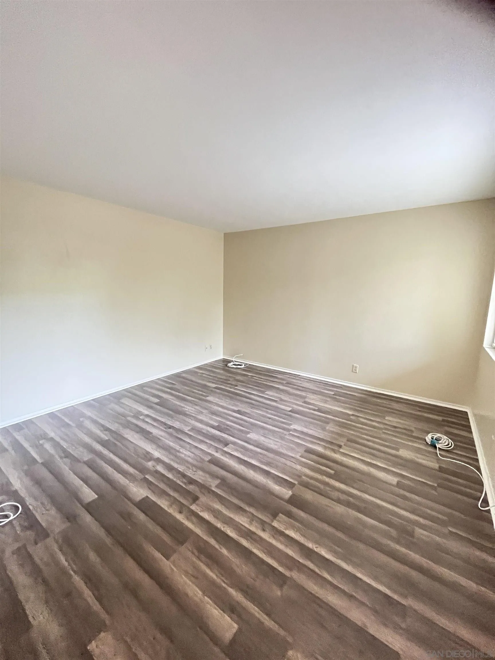 3719 Bay Leaf Way Oceanside, CA 92057 - Photo 11 of 33 a view of empty room with wooden floor