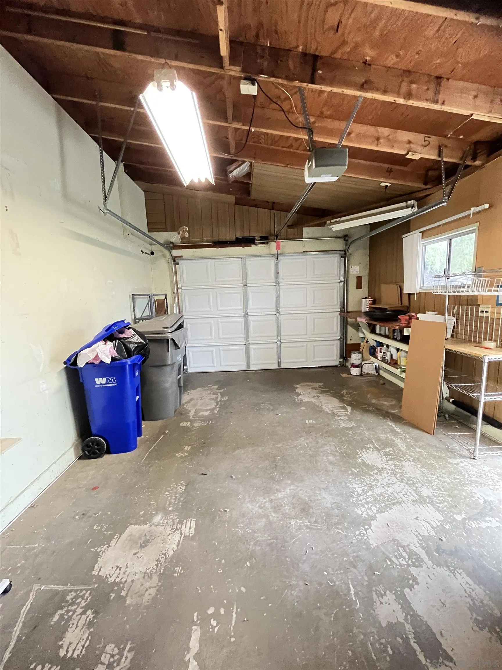 3719 Bay Leaf Way Oceanside, CA 92057 - Photo 23 of 33 a view of a garage room with windows