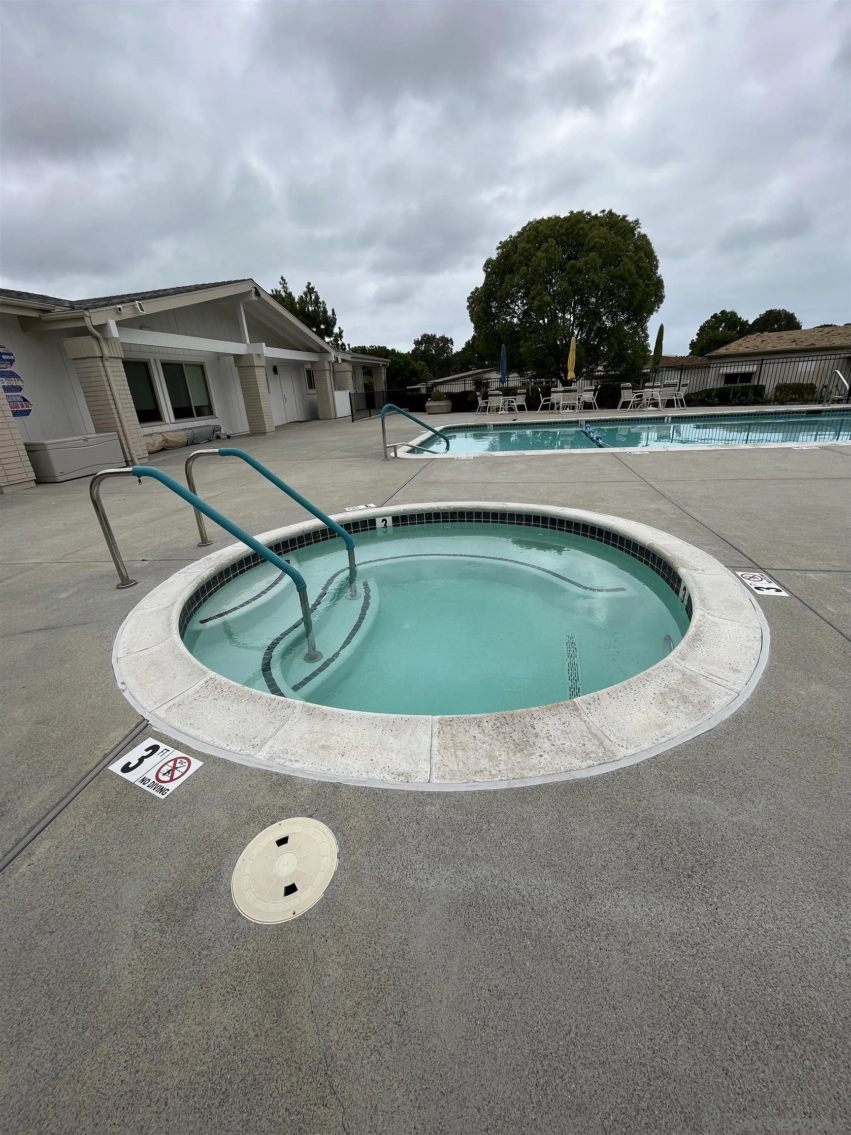 3719 Bay Leaf Way Oceanside, CA 92057 - Photo 28 of 33 a view of swimming pool with outdoor seating and plants in the back