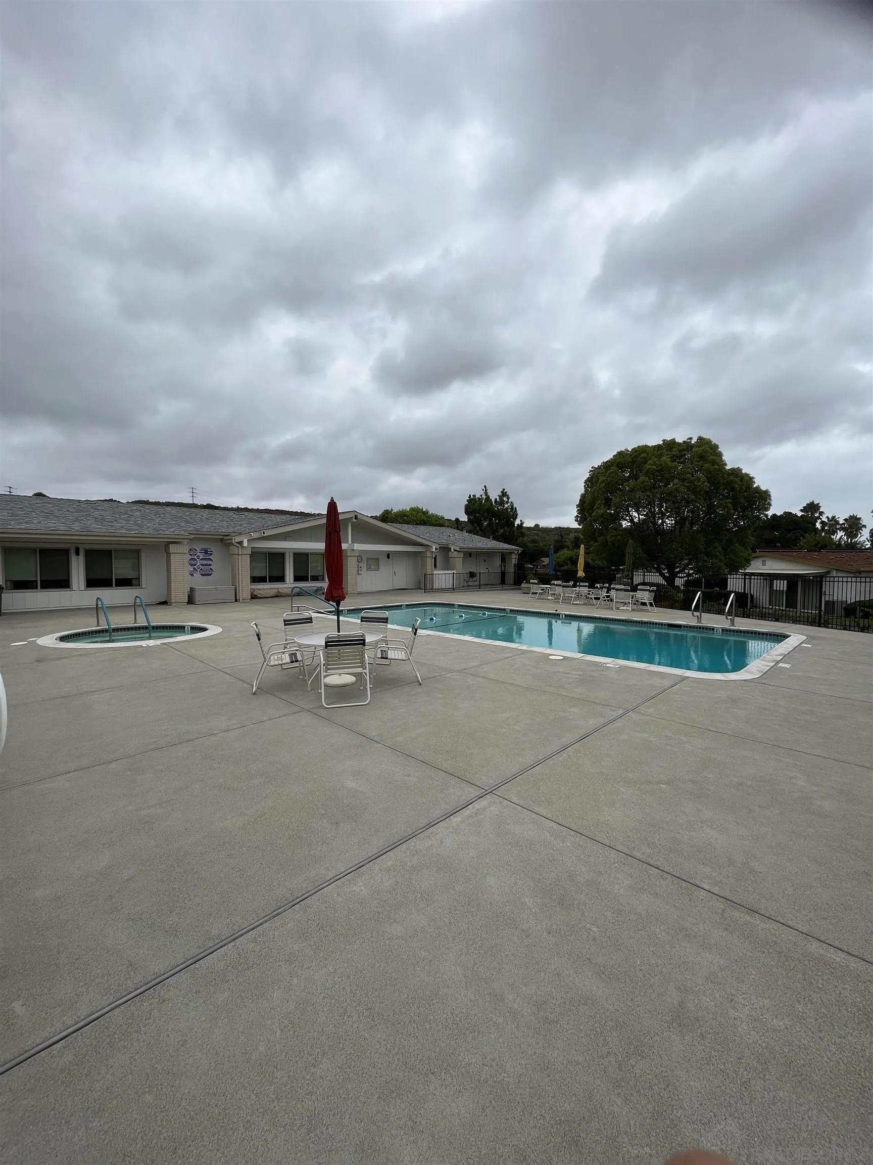 3719 Bay Leaf Way Oceanside, CA 92057 - Photo 31 of 33 a view of swimming pool with outdoor seating and barbeque in the back