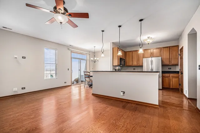 a view of a kitchen with appliances