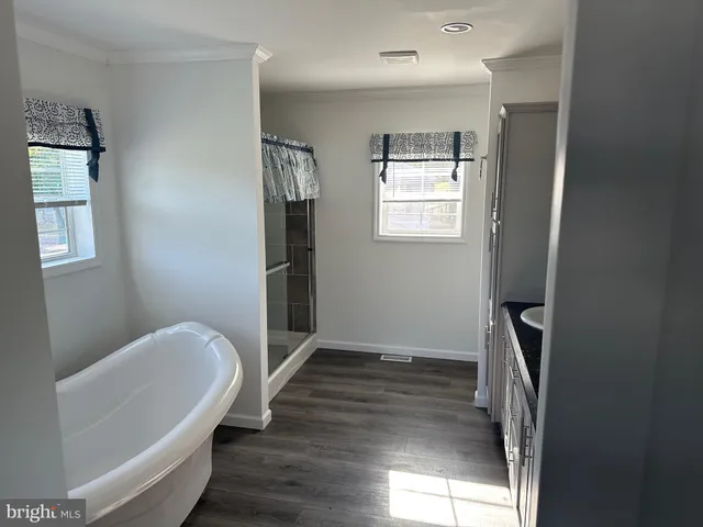 a bathroom with sink and mirror