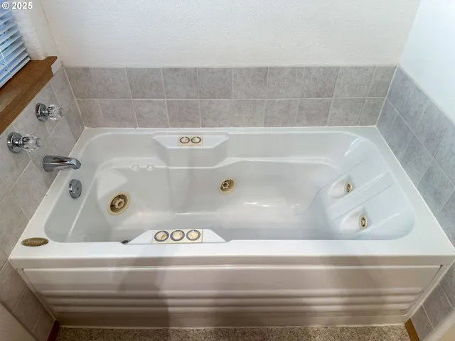 a bathroom with a bathtub