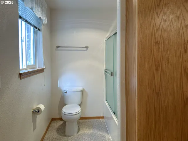 a bathroom with a toilet