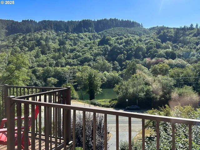 a balcony with an outdoor space