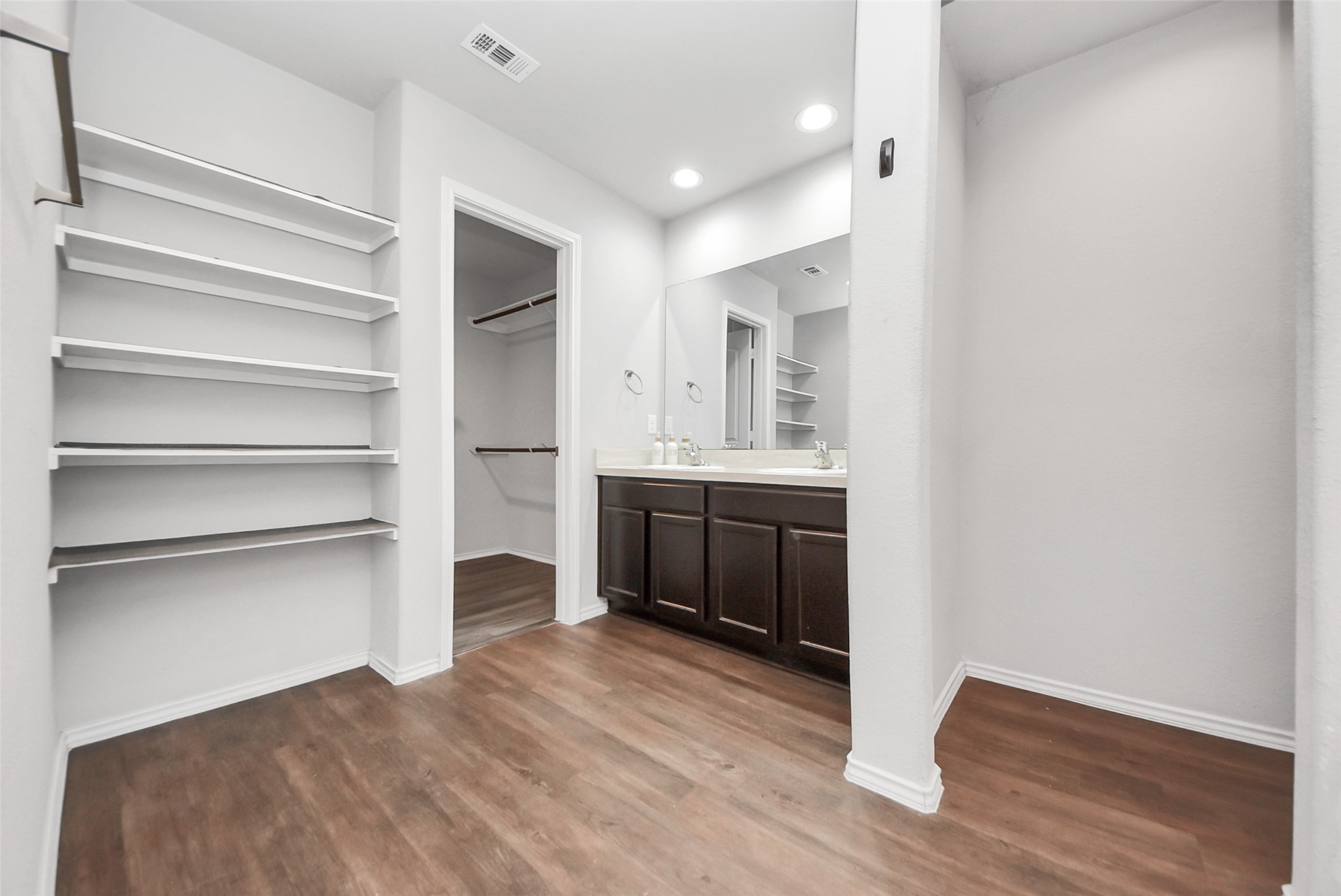 1227 Baja Vista Way Channelview, TX 77530 - Photo 13 of 25 a view of a kitchen with a sink cabinets and wooden floor