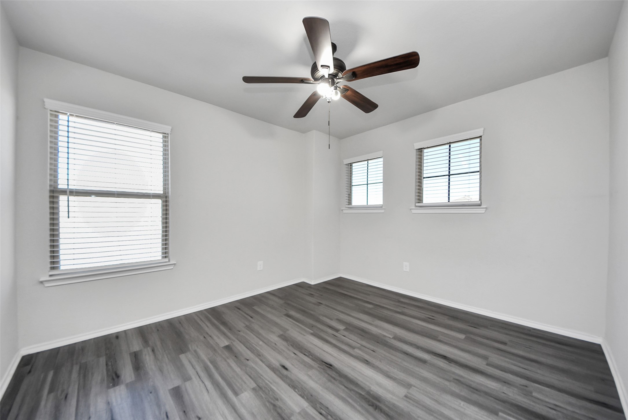 1227 Baja Vista Way Channelview, TX 77530 - Photo 17 of 25 a view of empty room with wooden floor