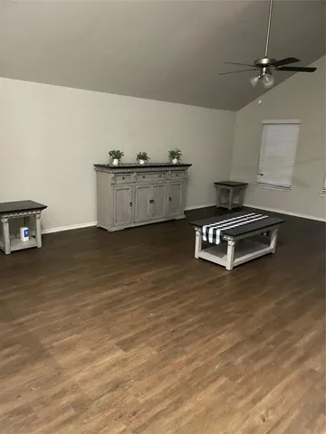 a view of a livingroom with furniture