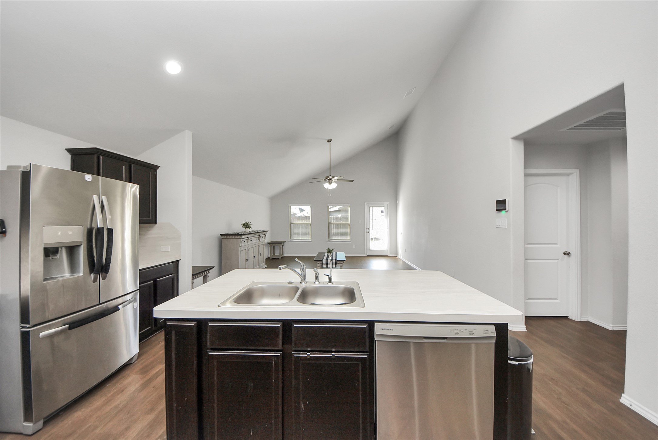 1227 Baja Vista Way Channelview, TX 77530 - Photo 8 of 25 a kitchen with stainless steel appliances a sink cabinets and wooden floor