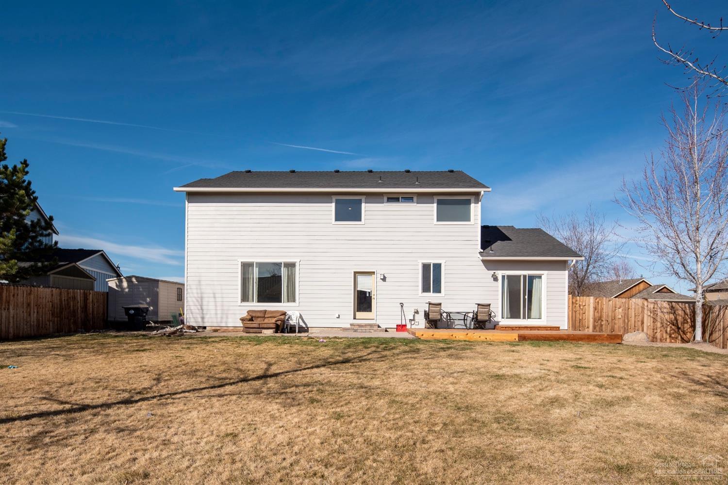 1622 Northwest Rimrock Drive Redmond, OR 97756 - Photo 19 of 22 Back yard fenced and landscaped with spr