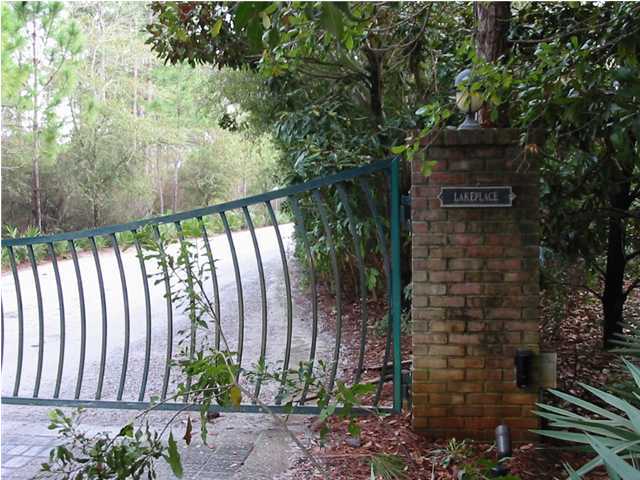 290 Wilderness Way Santa Rosa Beach, FL 32459 - Photo 2 of 3 a view of a pathway in a garden