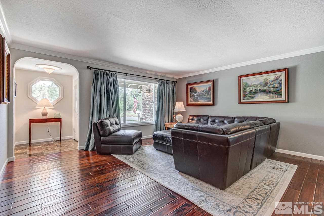 22810 Carriage Drive Reno, NV 89521 - Photo 8 of 31 a living room with furniture and a large window
