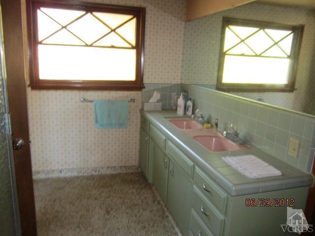 15 Vientos Road Camarillo, CA 93010 - Photo 19 of 25 a bathroom with a sink and a window