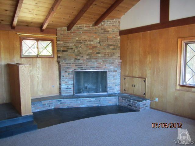 15 Vientos Road Camarillo, CA 93010 - Photo 4 of 25 a living room with furniture and a fireplace