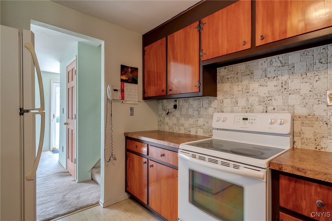 511 Rita Drive Clay, NY 13212 - Photo 19 of 41 Stairs take you to the Bedrooms and the door to th