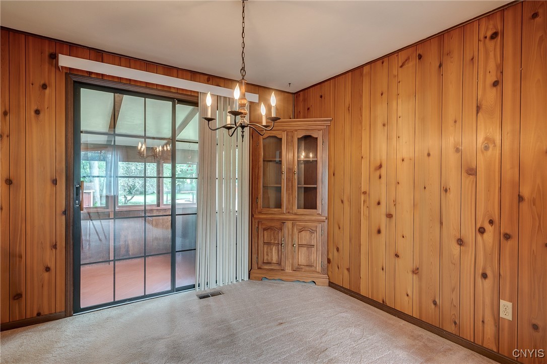 511 Rita Drive Clay, NY 13212 - Photo 10 of 41 Formal Dining Room leads to the 3 season room