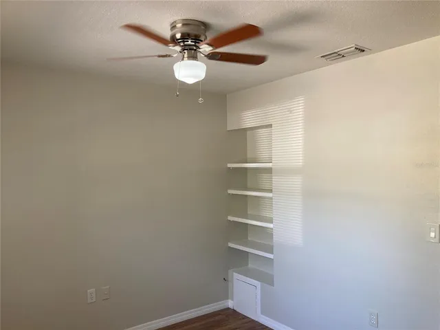 a view of a hallway with closet