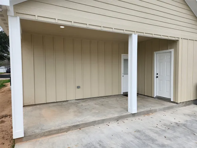 a view of a backyard of the house