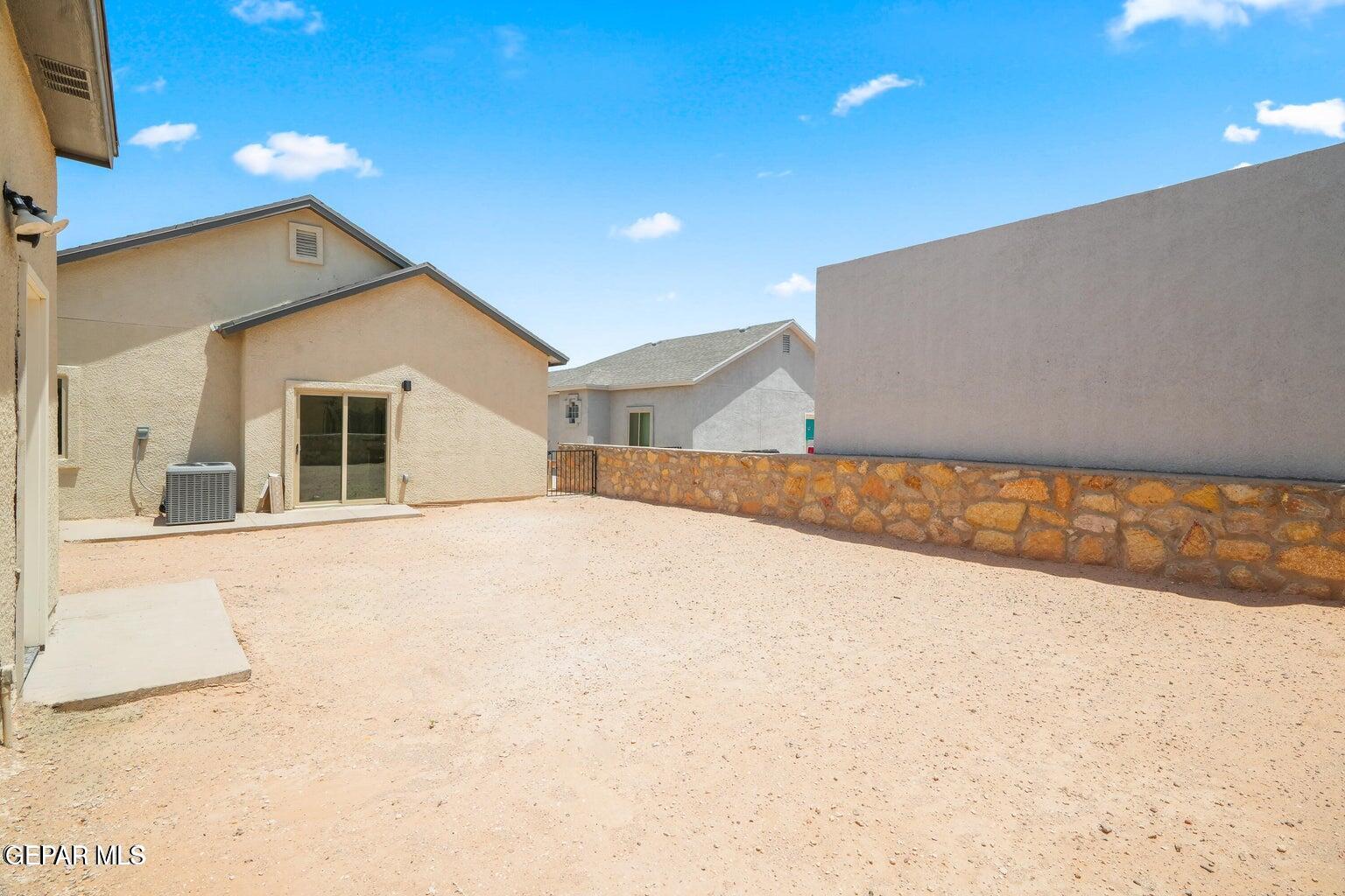 13090 Beccles Street El Paso, TX 79928 - Photo 16 of 23 a view of an house with a outdoor space
