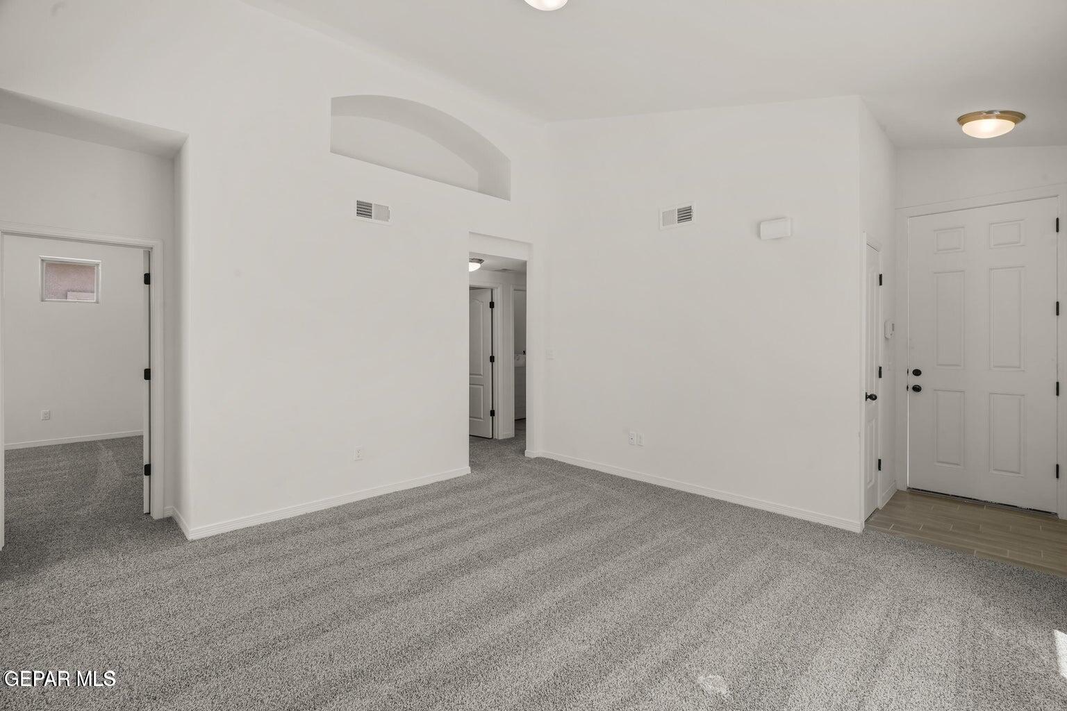 13090 Beccles Street El Paso, TX 79928 - Photo 3 of 23 a view of an empty room