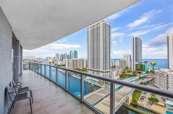 a view of a balcony with city view