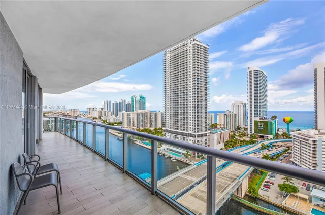 a view of a balcony with city view